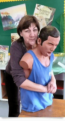 Marian from Woodstock Primary



 School is pictured here practising abdominal thrusts on Aquafield?s Choking Manikin.